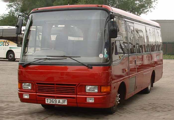 Motts Travel Toyota Coaster T369AJF